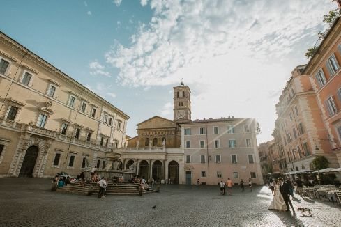 married couple posing in a beautiful italian square