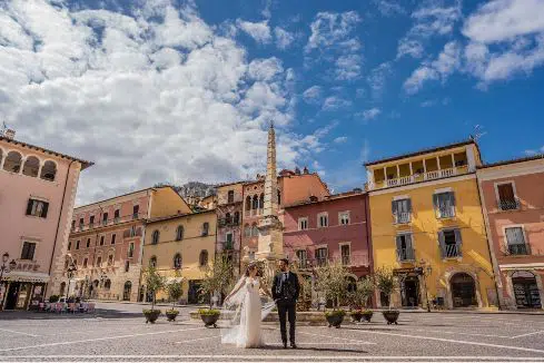 married couple at an Italian Piazza